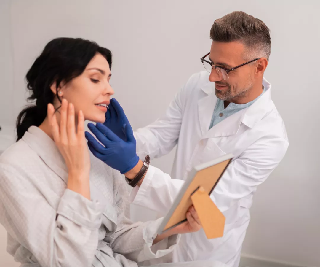 plastic-surgeon-with-patient-in-consultation-69bdc9ef1953a